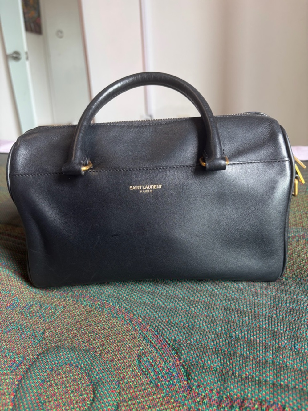 Saint Laurent classic Black Leather baby duffle with Gold Hardware